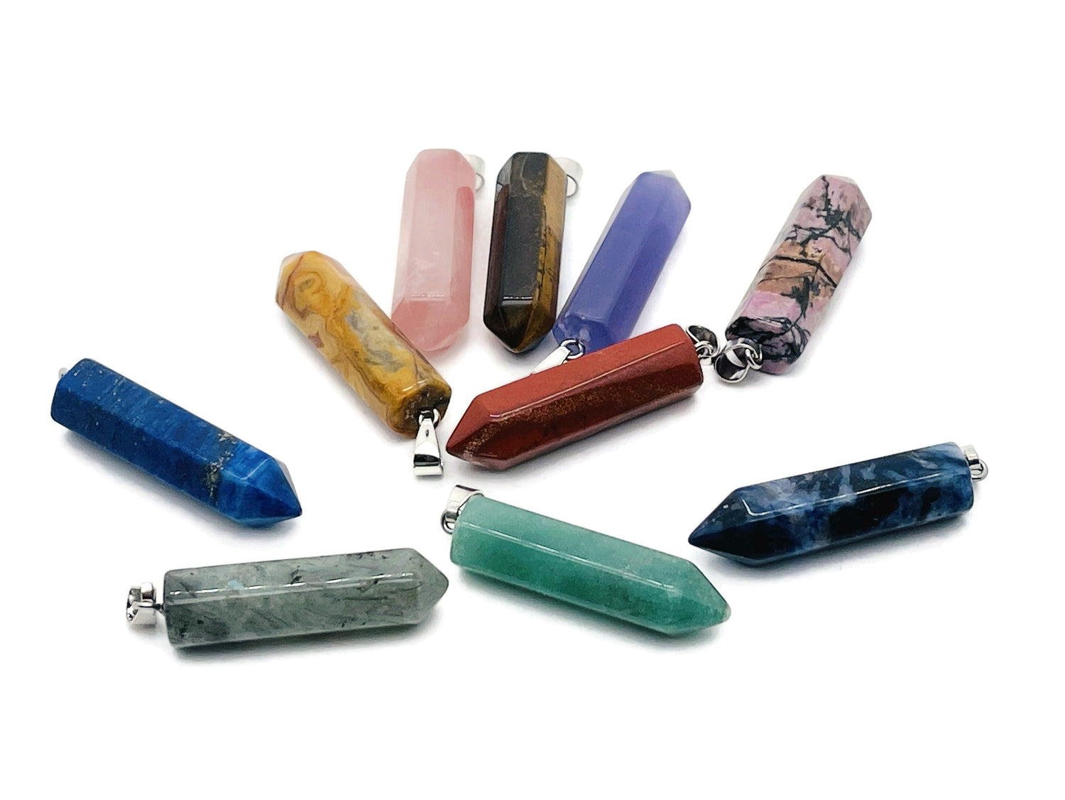 Crystal Point pendant from GemstoneGO, a versatile jewelry making supply featuring a clear, pointed crystal for necklaces or crafts.