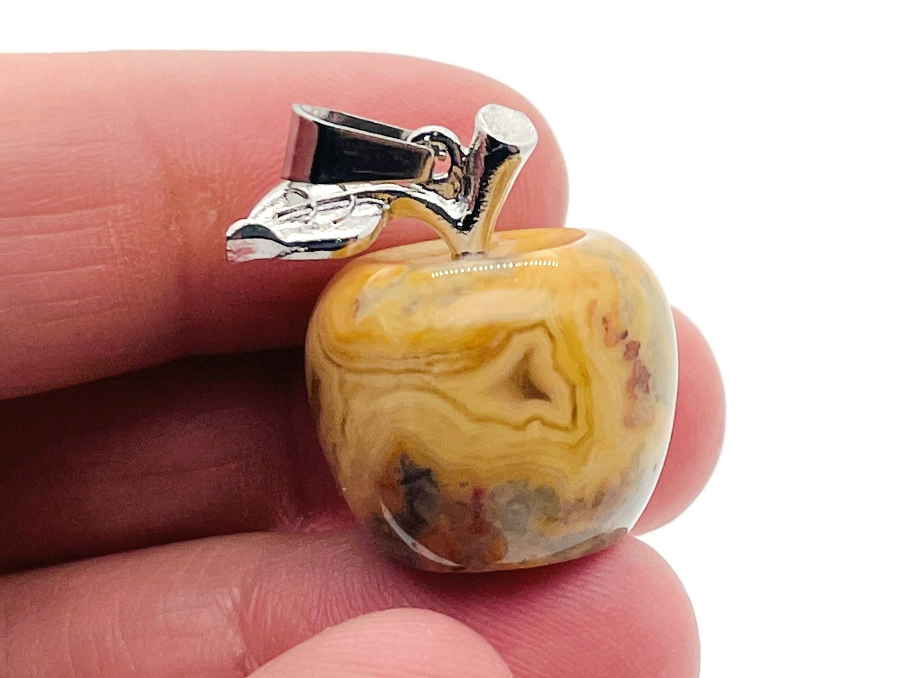 Crazy Lace Agate apple-shaped crystal pendant by GemstoneGO, featuring vibrant banded gemstone details on a mini crystal pendant.
