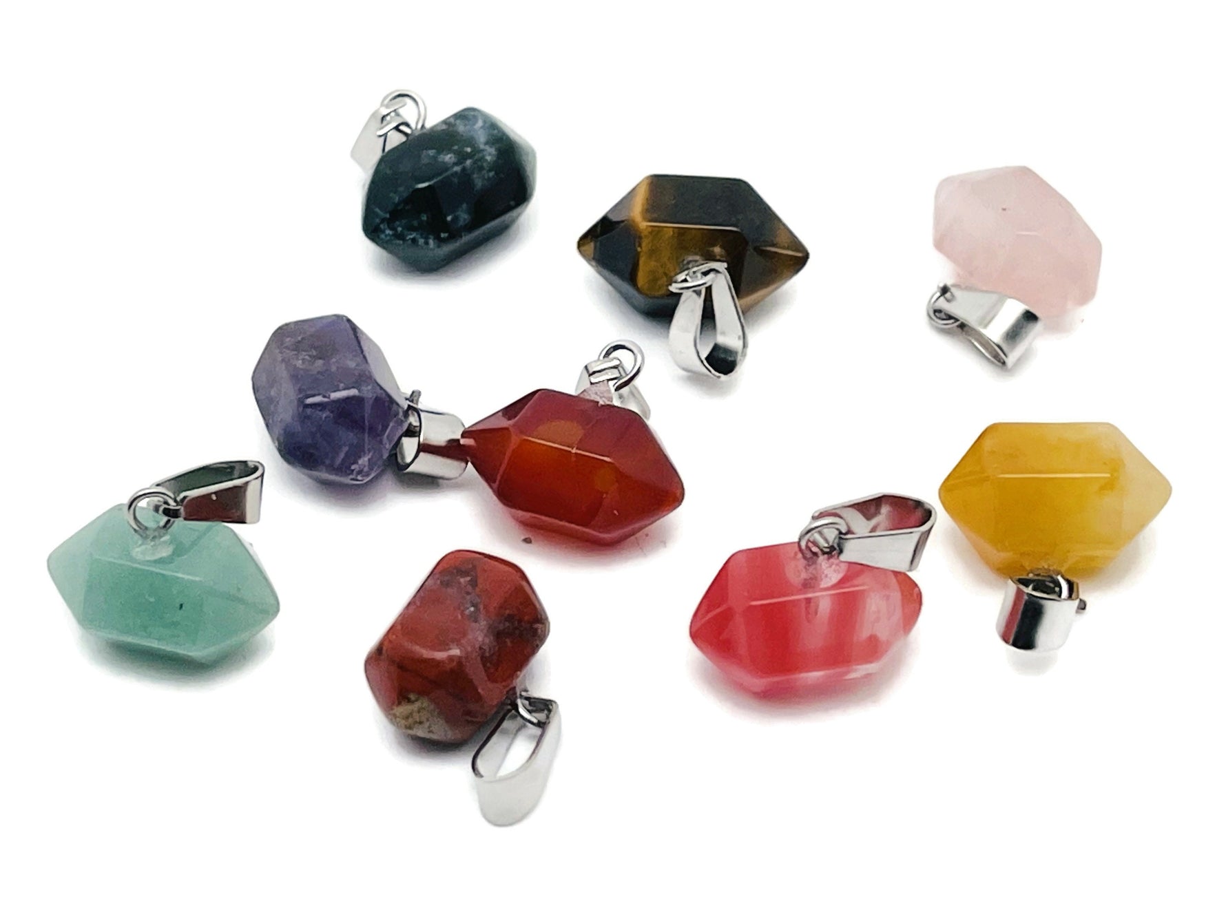 Mini point crystal pendant by GemstoneGO, transparent terminated crystal used for jewelry making supplies.