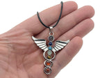 Angel wing crystal necklace with seven stones from GemstoneGO featuring a delicate silver chain and sparkling angel wing pendant.