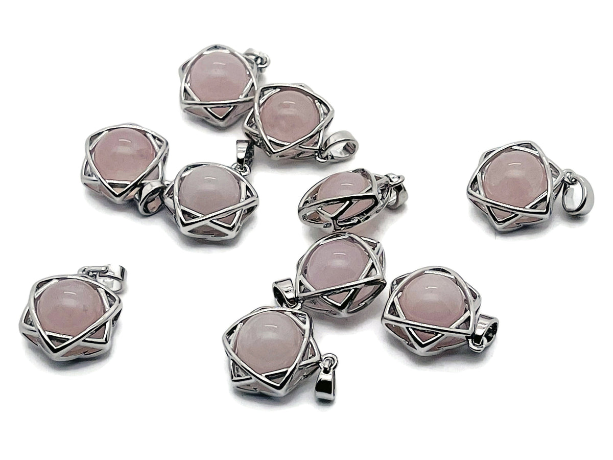 Rose quartz crystal pendant from GemstoneGO featuring a polished pink gemstone on a silver chain.