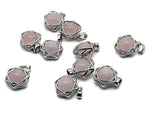 Rose quartz crystal pendant from GemstoneGO featuring a polished pink gemstone on a silver chain.