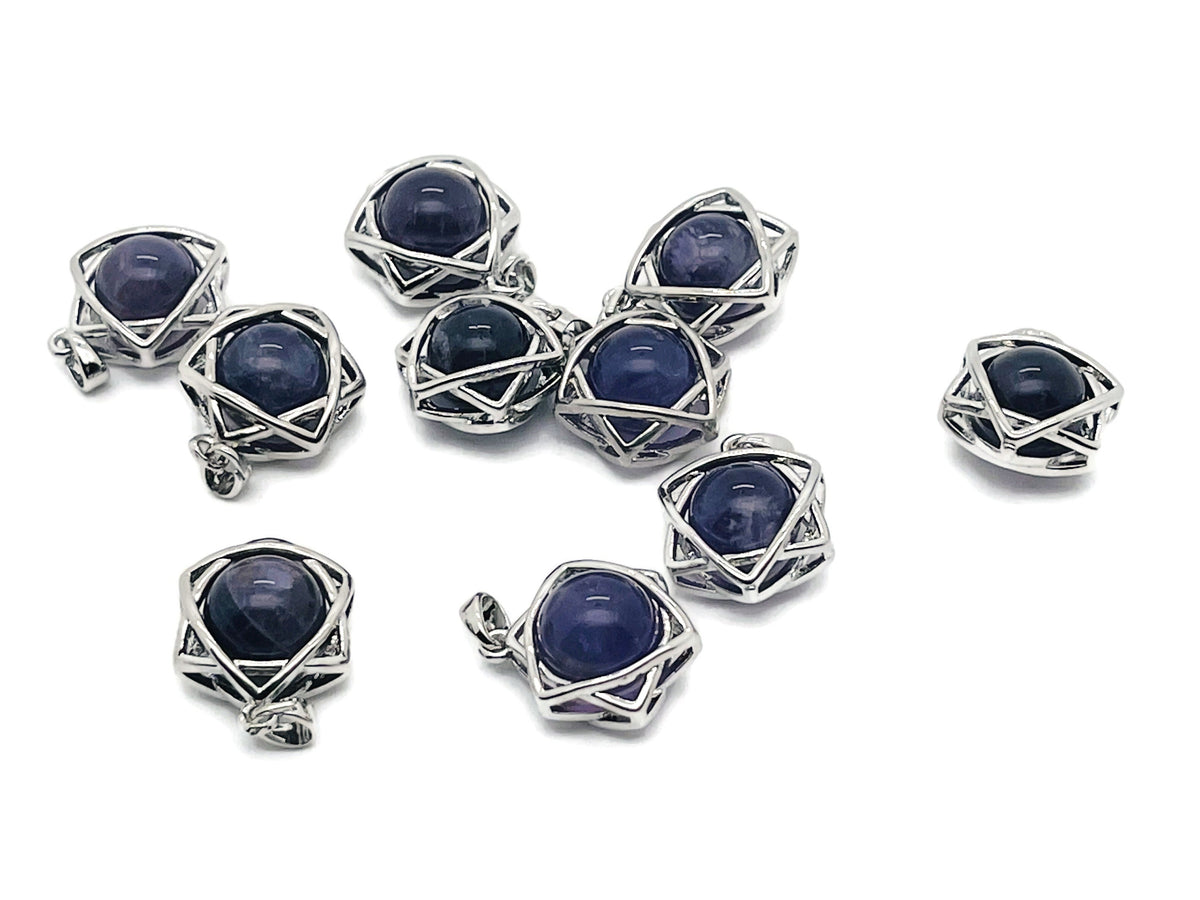 Amethyst crystal pendant jewelry featuring a polished purple gemstone on a silver chain, showcasing elegant gemstone craftsmanship.