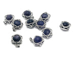 Amethyst crystal pendant jewelry featuring a polished purple gemstone on a silver chain, showcasing elegant gemstone craftsmanship.