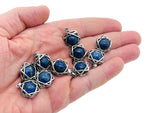 Lapis Lazuli crystal pendant from GemstoneGO, showcasing a vibrant blue gemstone with gold flecks, set in a silver jewelry setting.