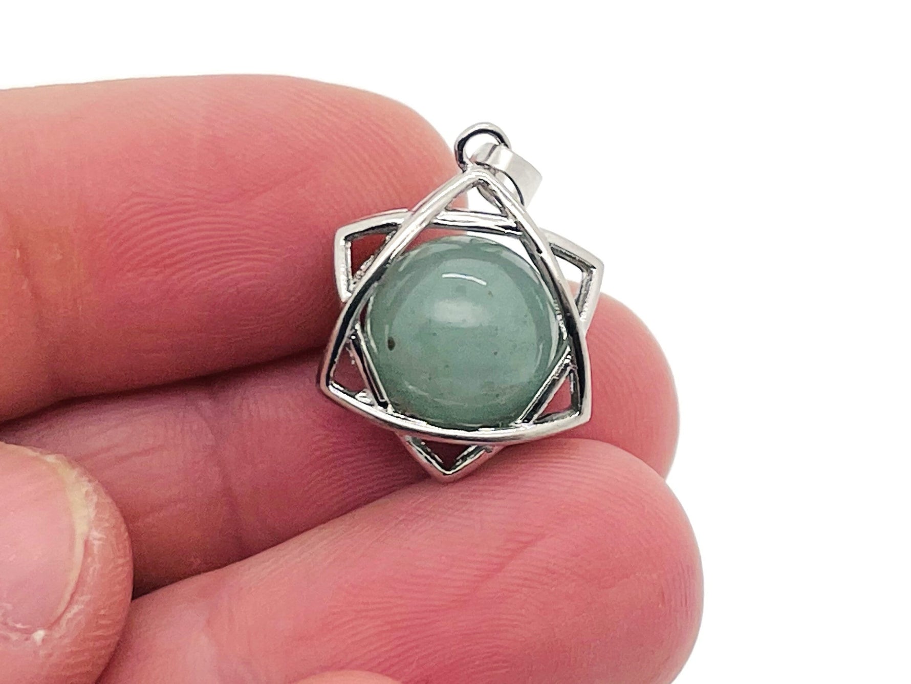 A aventurine crystal pendant necklace by GemstoneGO, featuring a smooth green gemstone on a delicate chain.