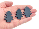 Handmade obsidian pine tree gemstone carving with detailed tree design, showcasing natural black stone texture and craftsmanship.