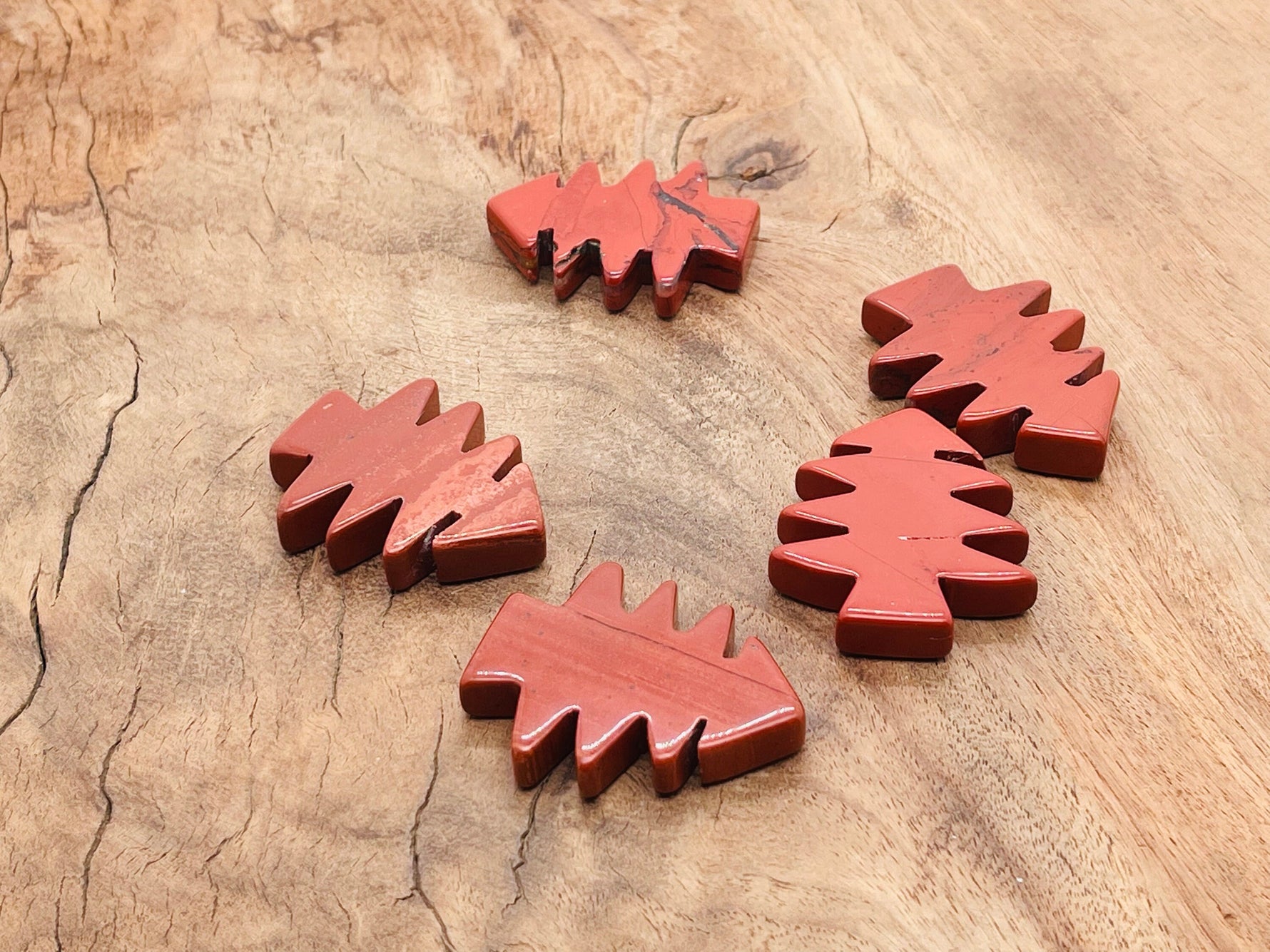 Handmade red jasper gemstone carving of a pine tree, detailed natural stone art by GemstoneGO.