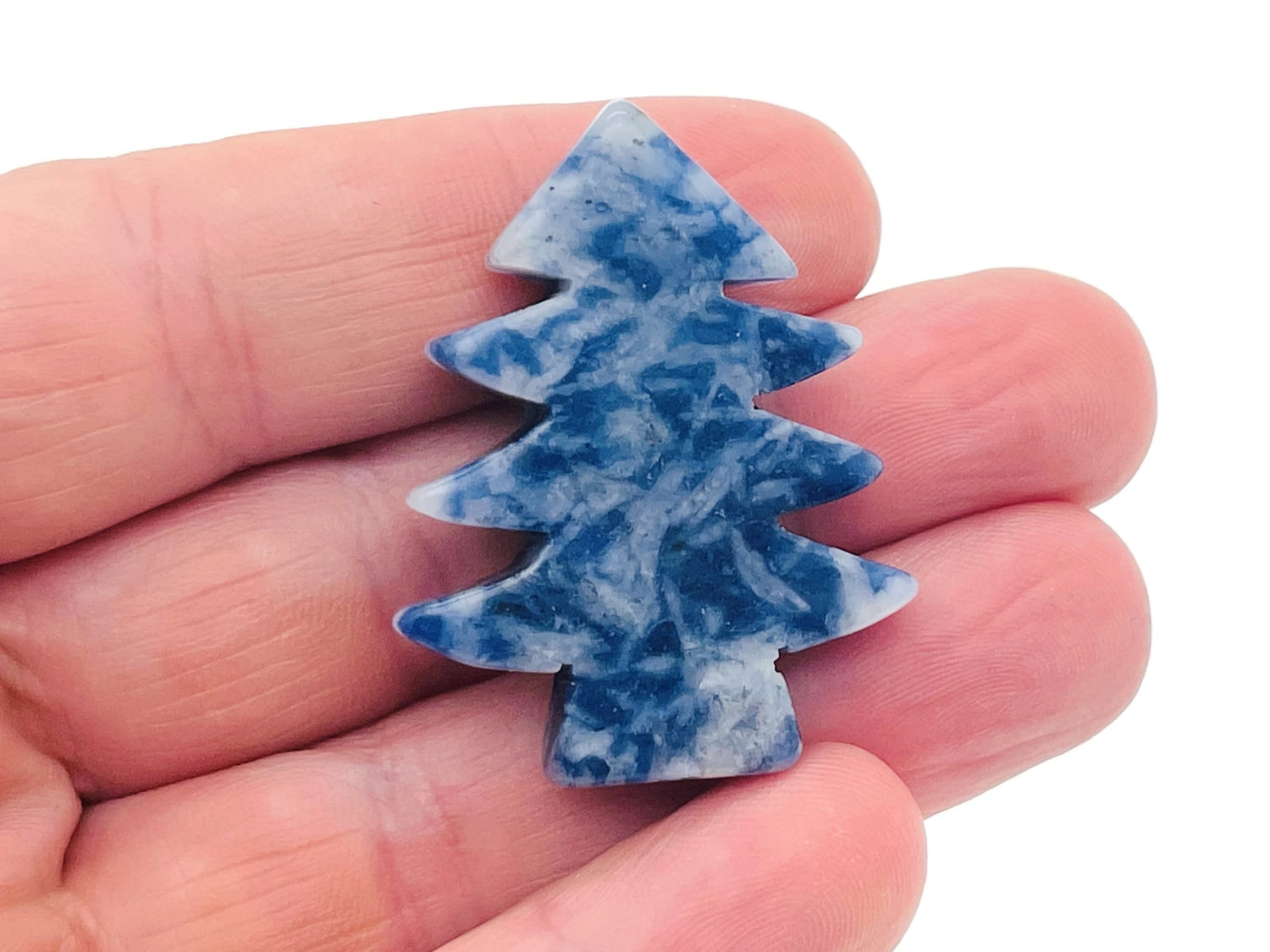 Blue Spot Jasper pine tree carving gemstone, handmade tree stone with intricate details, showcasing natural blue and earthy tones.