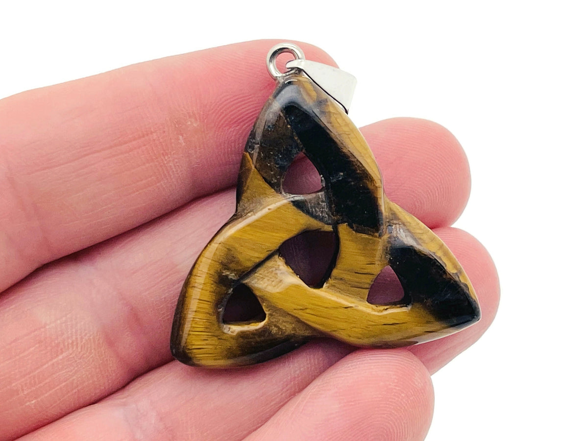 Celtic Knot Crystal Pendant with Trinity Crystals by GemstoneGO, featuring gemstone accents and intricate Celtic design.