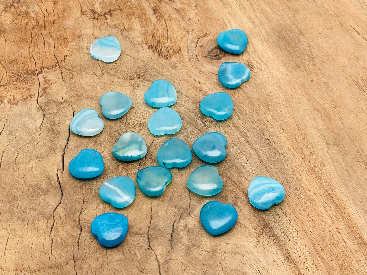 Blue agate heart-shaped gemstone pendant, 20x20x6mm, from GemstoneGO, showcasing a polished, vibrant blue stone with natural banding.