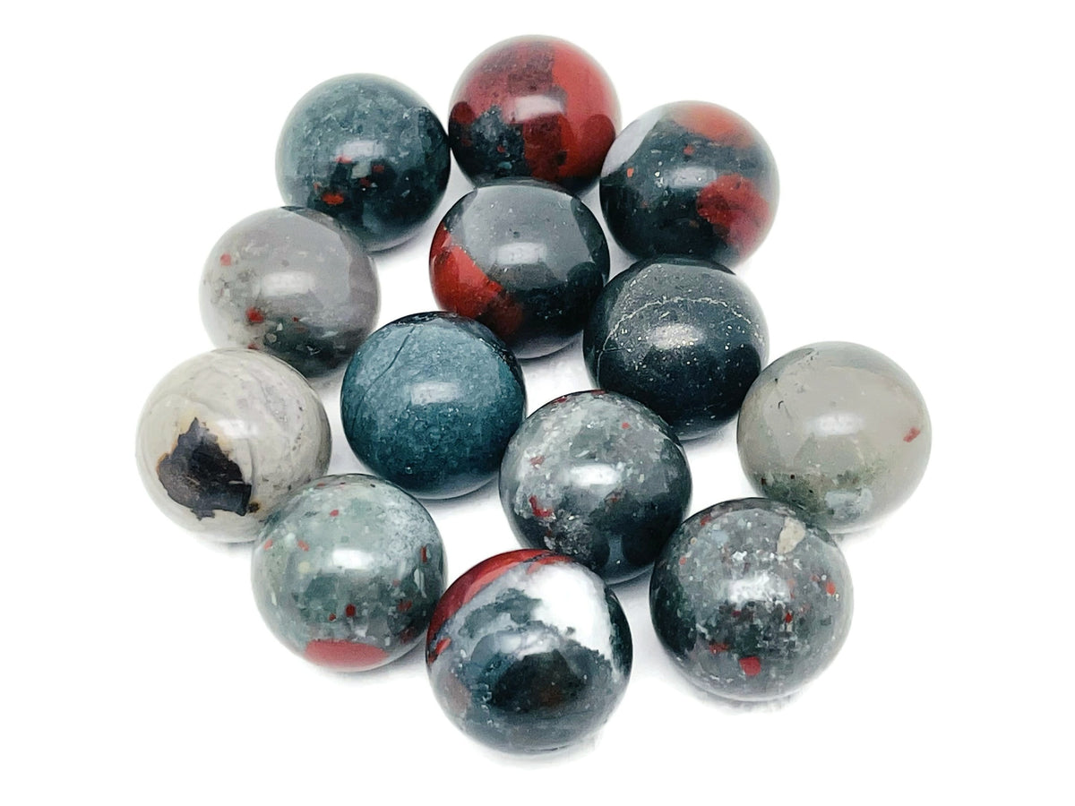 20mm African Bloodstone sphere gemstone from GemstoneGO, showcasing a deep green stone with red bloodstone inclusions.