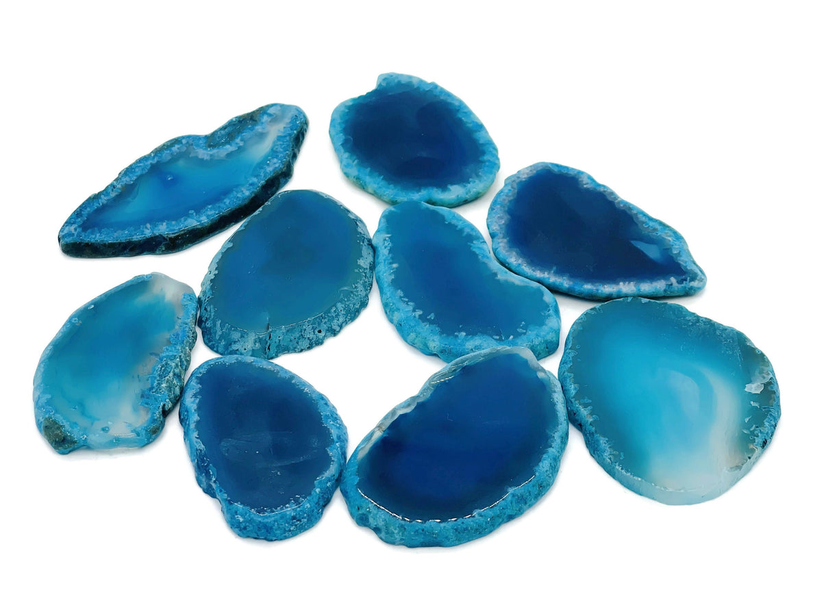 Blue agate slice geode raw crystal from GemstoneGO, showcasing vibrant blue banding and natural crystal formations.