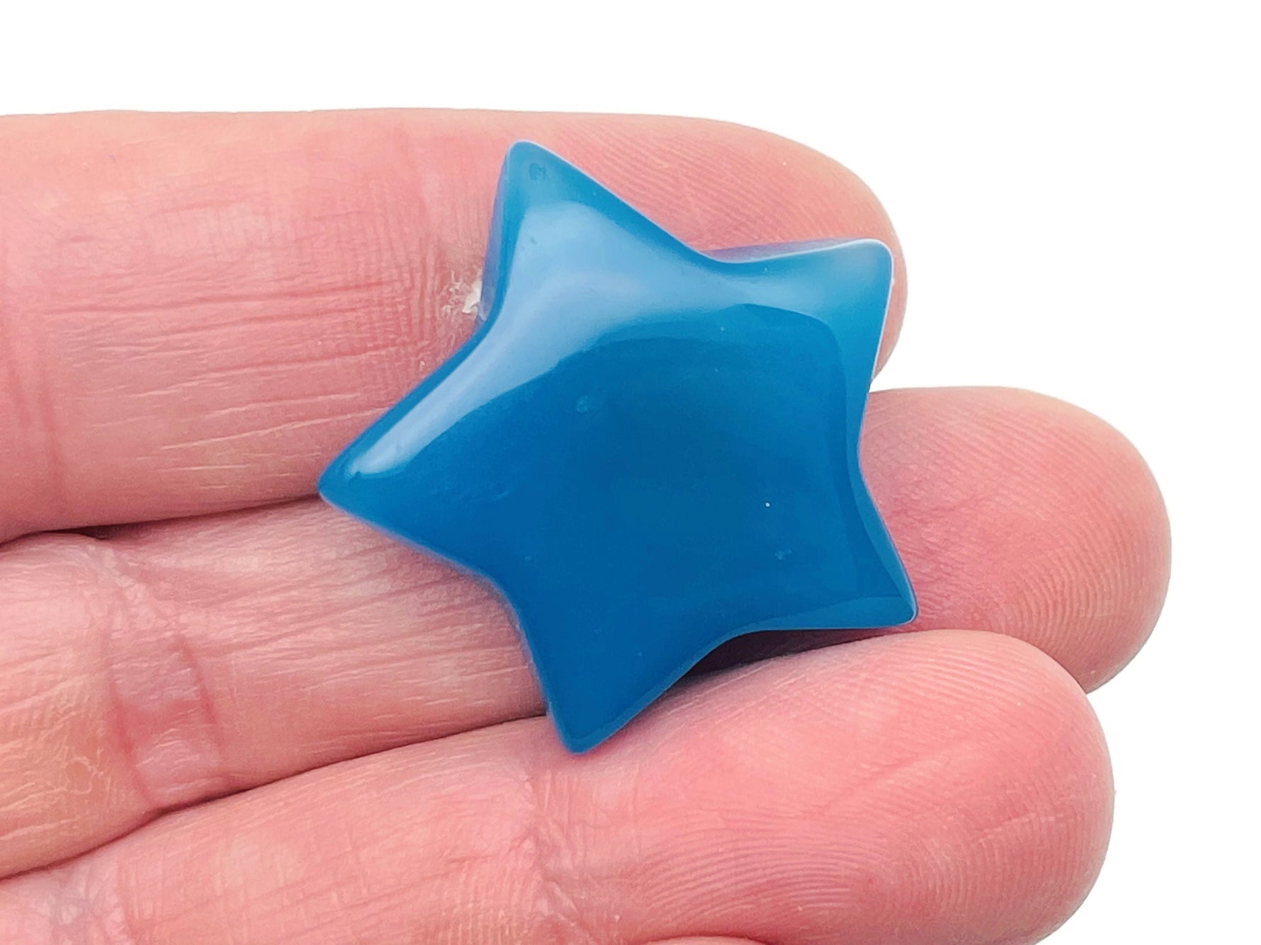 Blue Agate star-shaped gemstone pendant, 30mm, from GemstoneGO, showcasing vibrant blue and natural stone patterns.