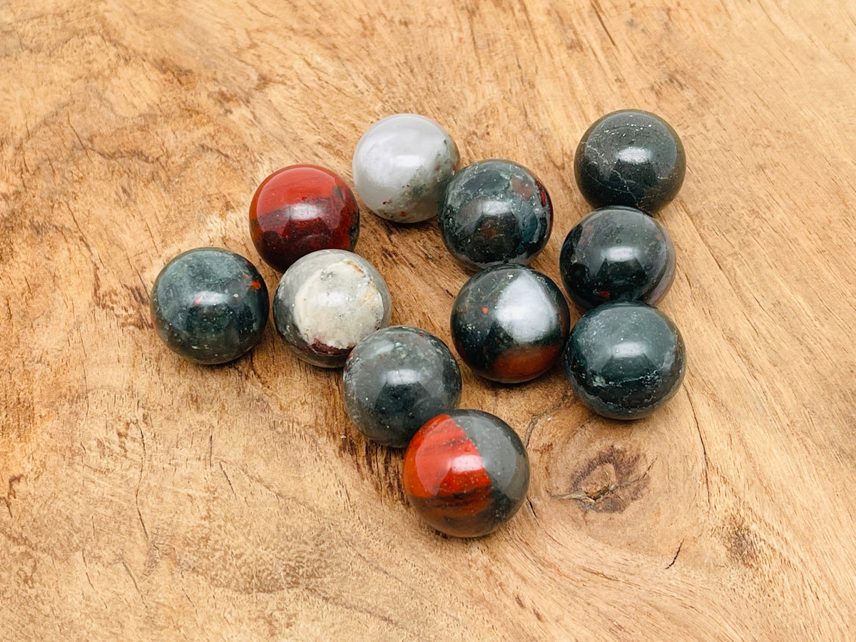 20mm African Bloodstone sphere gemstone from GemstoneGO, featuring deep green and red mineral patterns in a polished crystal ball.