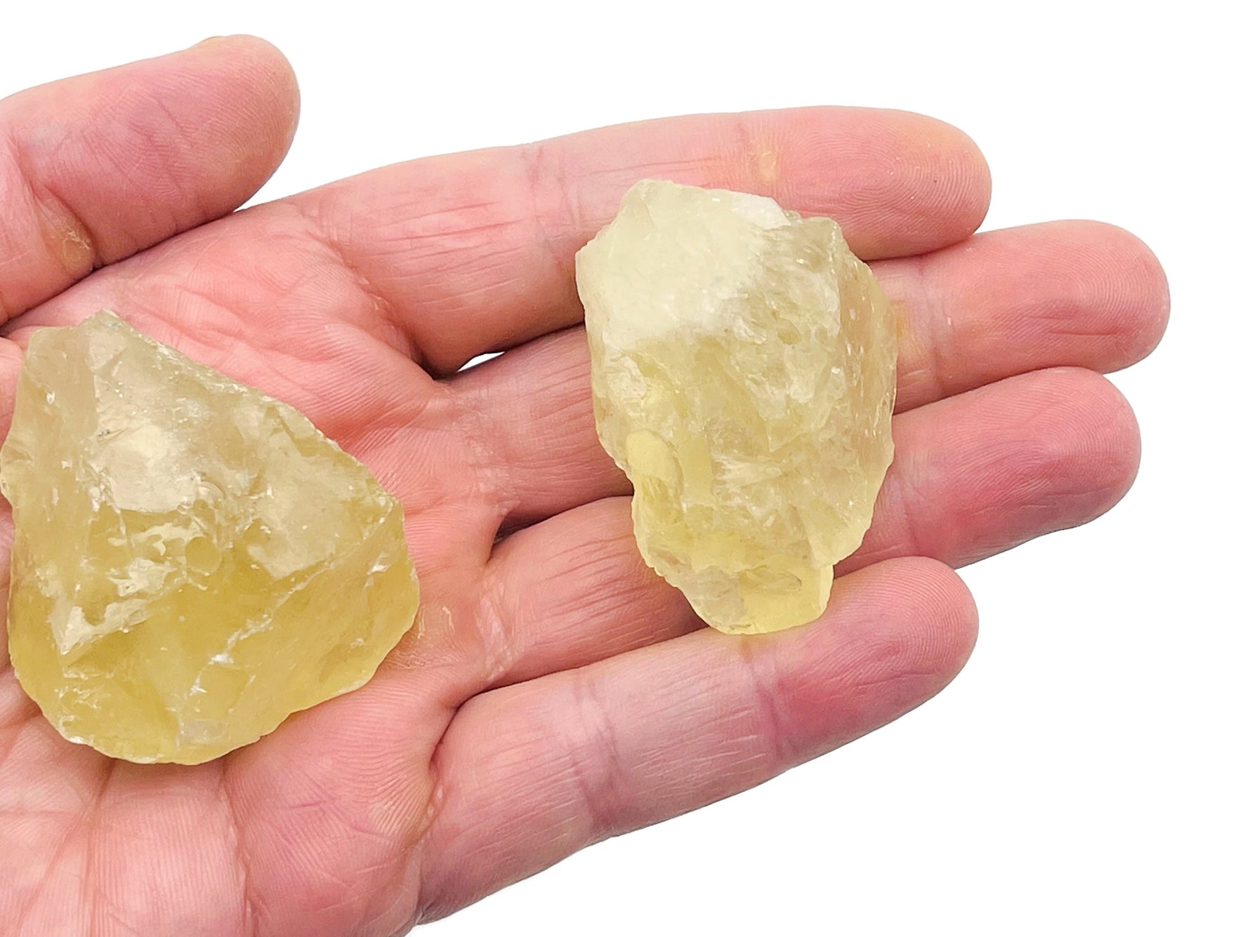 Handmade carved citrine rough crystal incense holder with a natural stone appearance, designed for incense sticks.