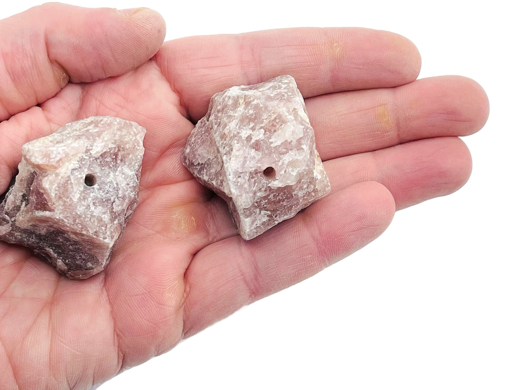 Handmade strawberry quartz rough crystal incense holder with carved design, perfect for holding incense sticks.