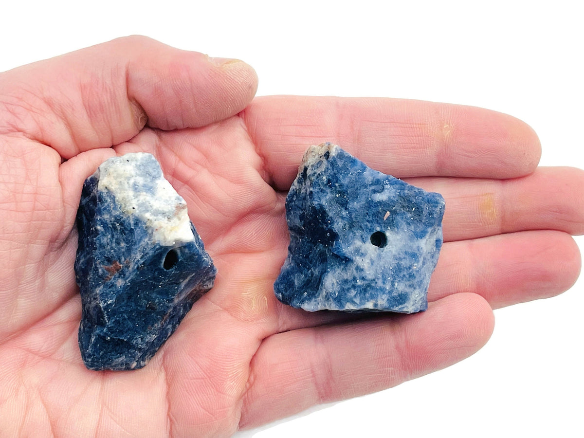 Handmade sodalite rough crystal incense holder with carved design, perfect for holding incense sticks.