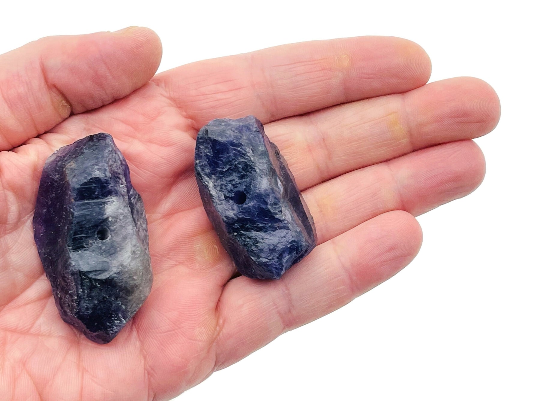 Handmade amethyst rough crystal incense holder with carved design, perfect for holding incense sticks and adding natural decor.