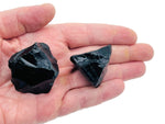 Handmade obsidian rough crystal incense holder with carved design, perfect for holding incense sticks securely.