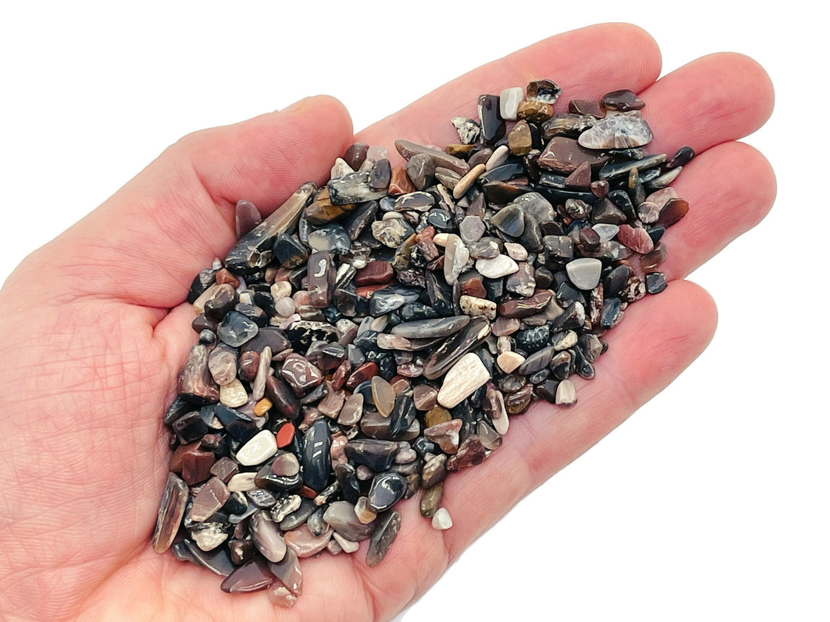 Semi-tumbled petrified wood crystal chips from GemstoneGO, 5-7mm bulk gemstones with natural wood-like appearance.