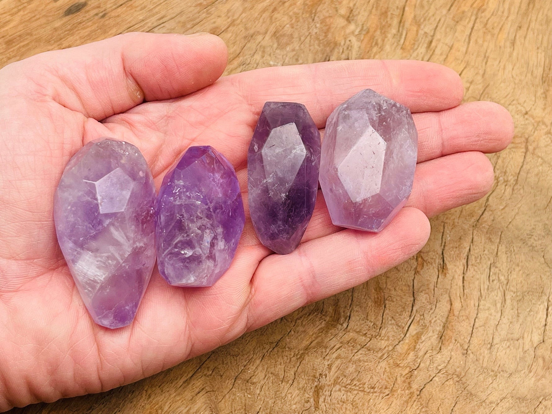 Amethyst double obelisk tower crystal from GemstoneGO, showcasing deep purple amethyst points and natural crystalline structure.