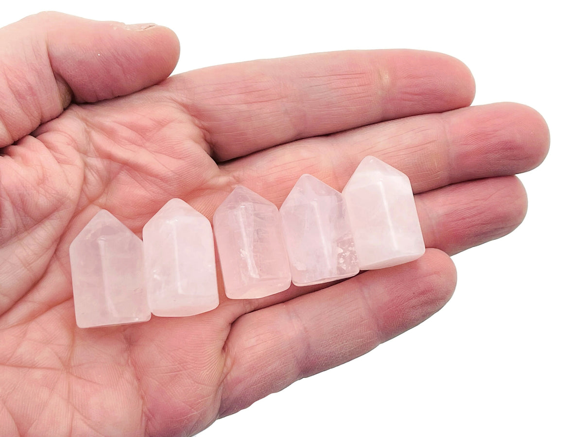 Large 25mm rose quartz gemstone from GemstoneGO showcasing its soft pink color and smooth polished surface.