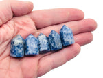 Blue Spot Jasper obelisk tower crystal by GemstoneGO, showcasing a polished blue and brown gemstone obelisk with natural patterns.