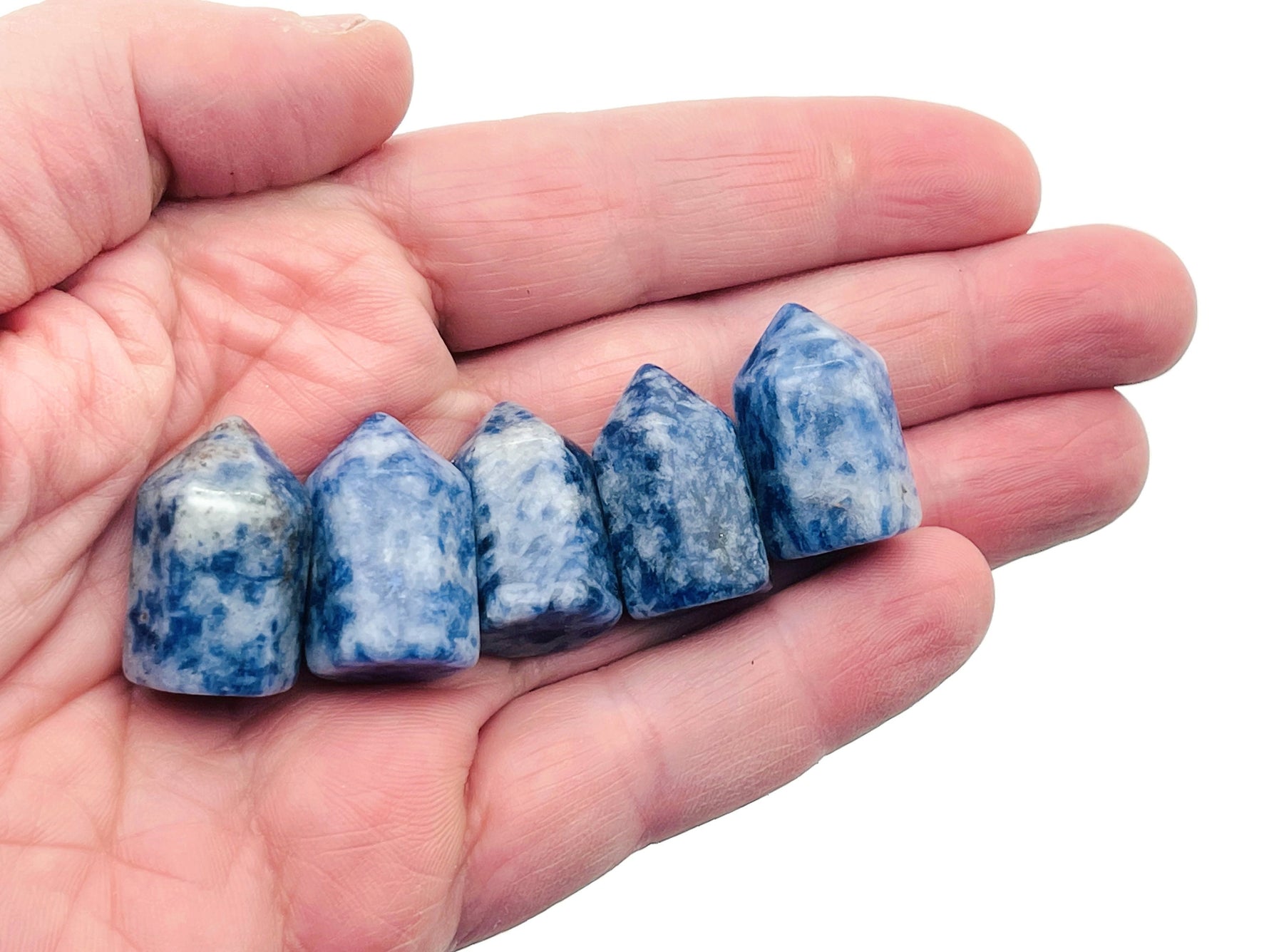 Blue Spot Jasper obelisk tower crystal by GemstoneGO, showcasing a polished blue and brown gemstone obelisk with natural patterns.