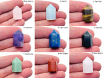Hand-carved Mini Obelisk Tower Crystal from GemstoneGO, 25mm healing crystal point with mixed gemstone colors and patterns.