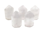 Clear Quartz obelisk tower crystal measuring 25mm from GemstoneGO, showcasing a polished, transparent gemstone with natural clarity.