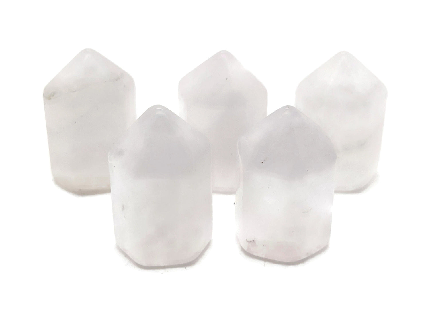 Clear Quartz obelisk tower crystal measuring 25mm from GemstoneGO, showcasing a polished, transparent gemstone with natural clarity.