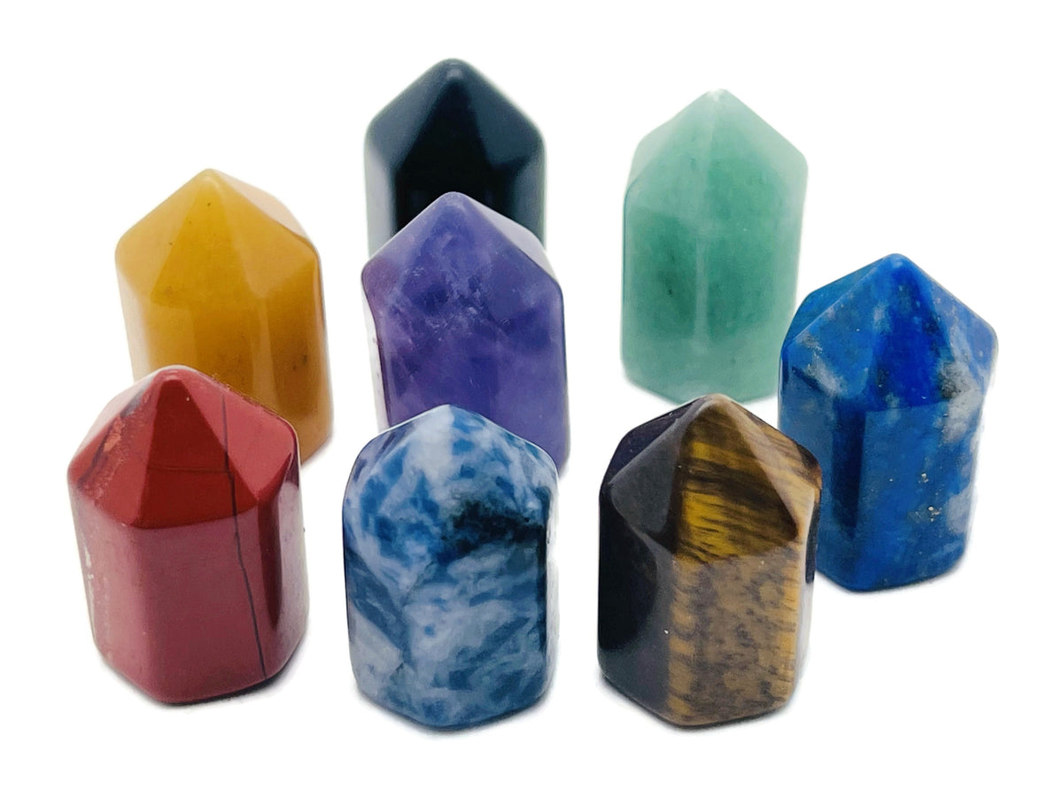 Hand-carved mini obelisk tower crystal from GemstoneGO, 25mm healing crystal point with mixed gemstone colors.