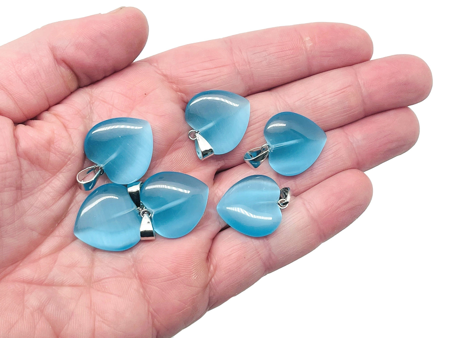 Blue Cats Eye heart-shaped crystal pendant from GemstoneGO featuring healing crystals, mini size, ideal for gifts or jewelry.