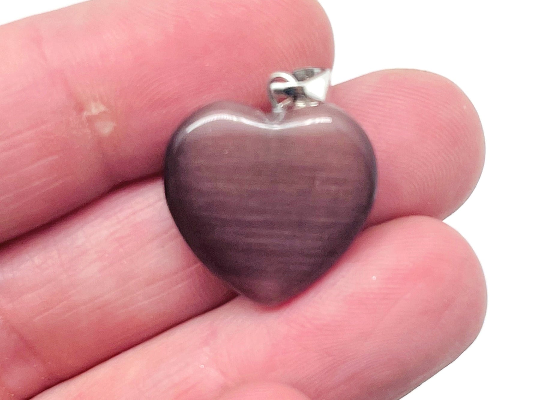 Brown cats eye heart pendant with crystals from GemstoneGO, featuring a healing mini crystal design for jewelry or gifts.