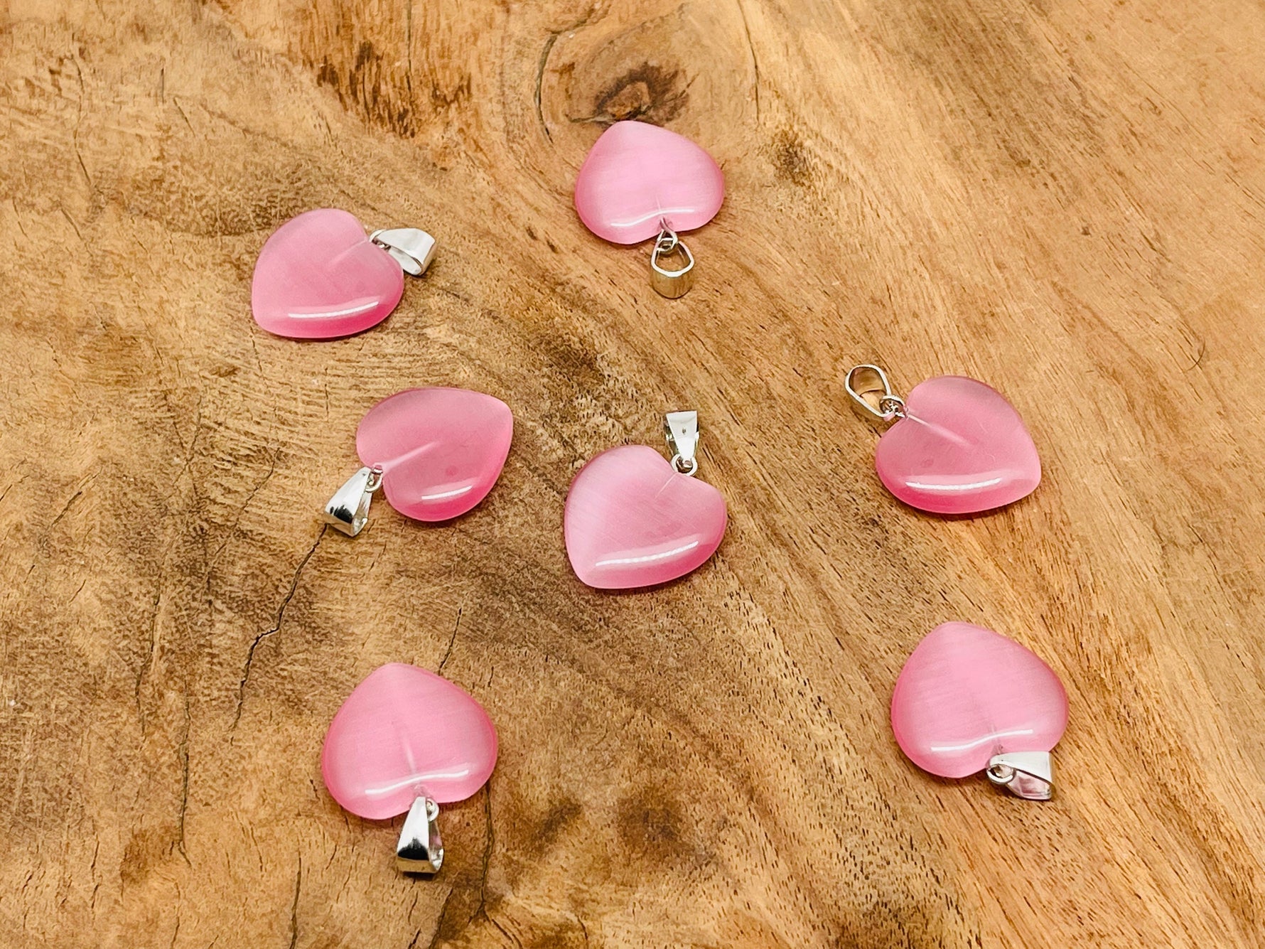 Pink cats eye heart pendant with crystals, gemstone jewelry by GemstoneGO, featuring a mini crystal design on a chain.