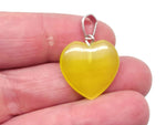 Yellow cat's eye heart pendant with crystals by GemstoneGO, featuring a mini healing crystal design on a chain.