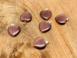 Brown cats eye heart pendant with crystal accents from GemstoneGO, showcasing a mini healing gemstone jewelry piece.