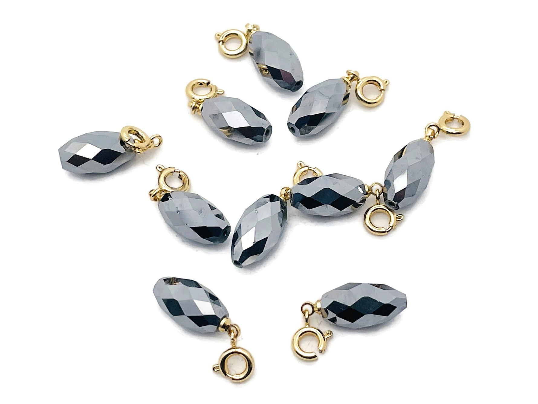 Terahertz crystal pendant from GemstoneGO, featuring a polished gemstone used in jewelry making, shown against a neutral background.