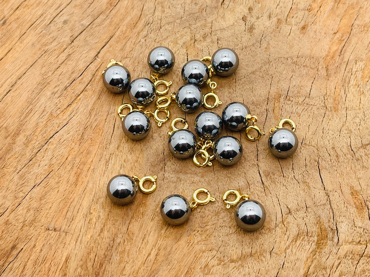 Terahertz ball gemstone pendant from GemstoneGO, featuring a polished round gemstone for jewelry making displays.