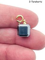 GemstoneGO terahertz gemstone pendant for jewelry making, showcasing a vibrant, polished gemstone on a silver chain.