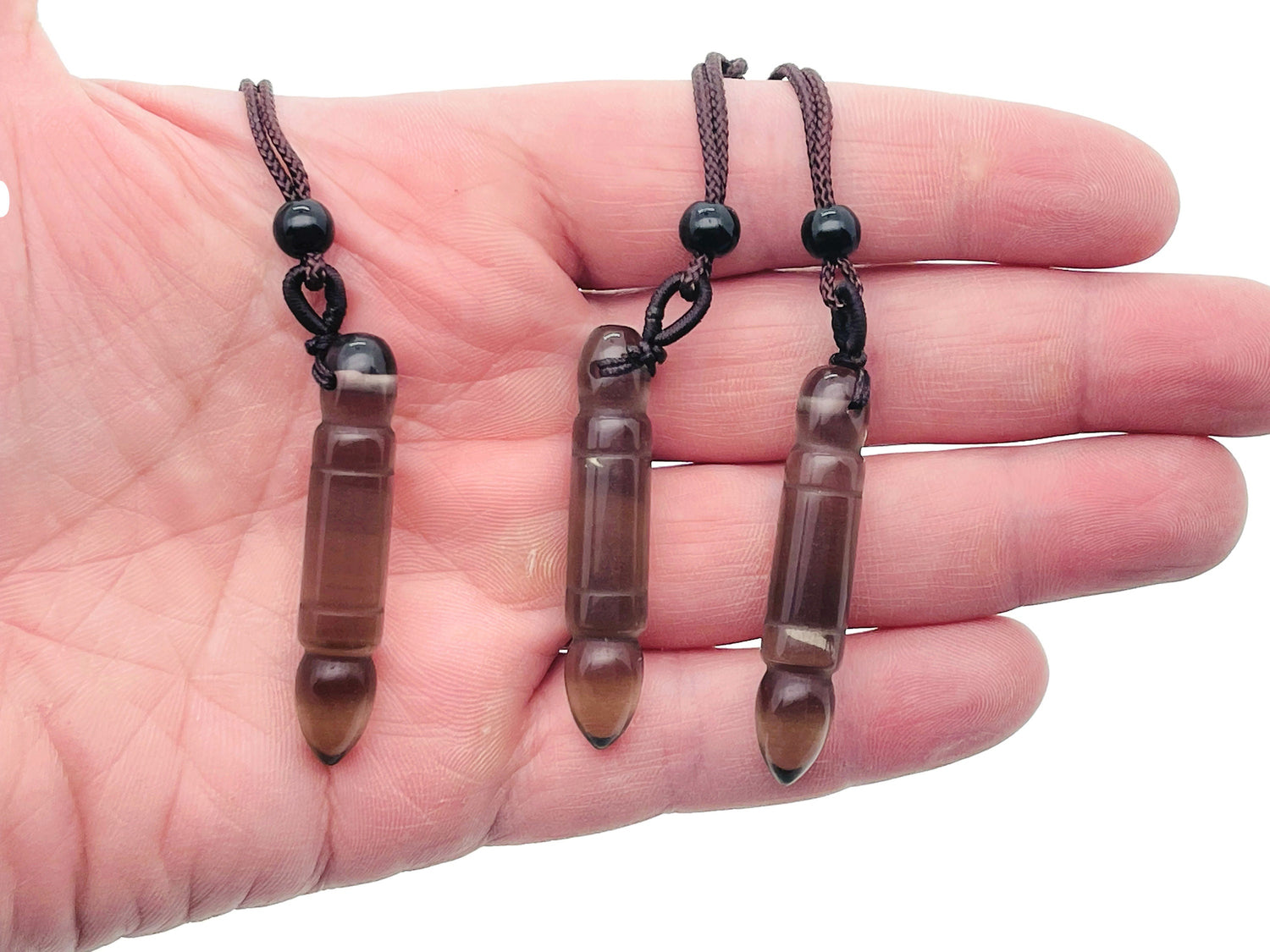 Smoky Quartz bullet crystal necklace on a cord, featuring a polished gemstone pendant with silver-tone clasp from GemstoneGO.