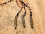Smoky quartz bullet crystal necklace on cord from GemstoneGO, featuring a polished teardrop-shaped gemstone pendant.