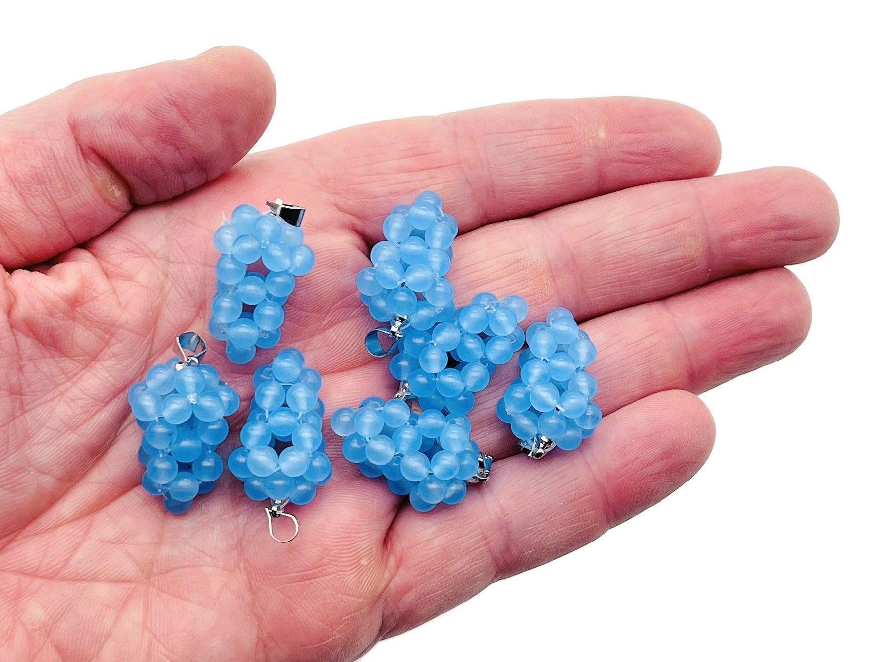 Blue Agate Grape Crystal Pendant by GemstoneGO, featuring a detailed crystal grape design on a silver setting.