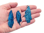 Blue Kyanite fan crystal pendant from GemstoneGO, showcasing a vibrant blue gemstone with a fan-shaped design and silver bail.