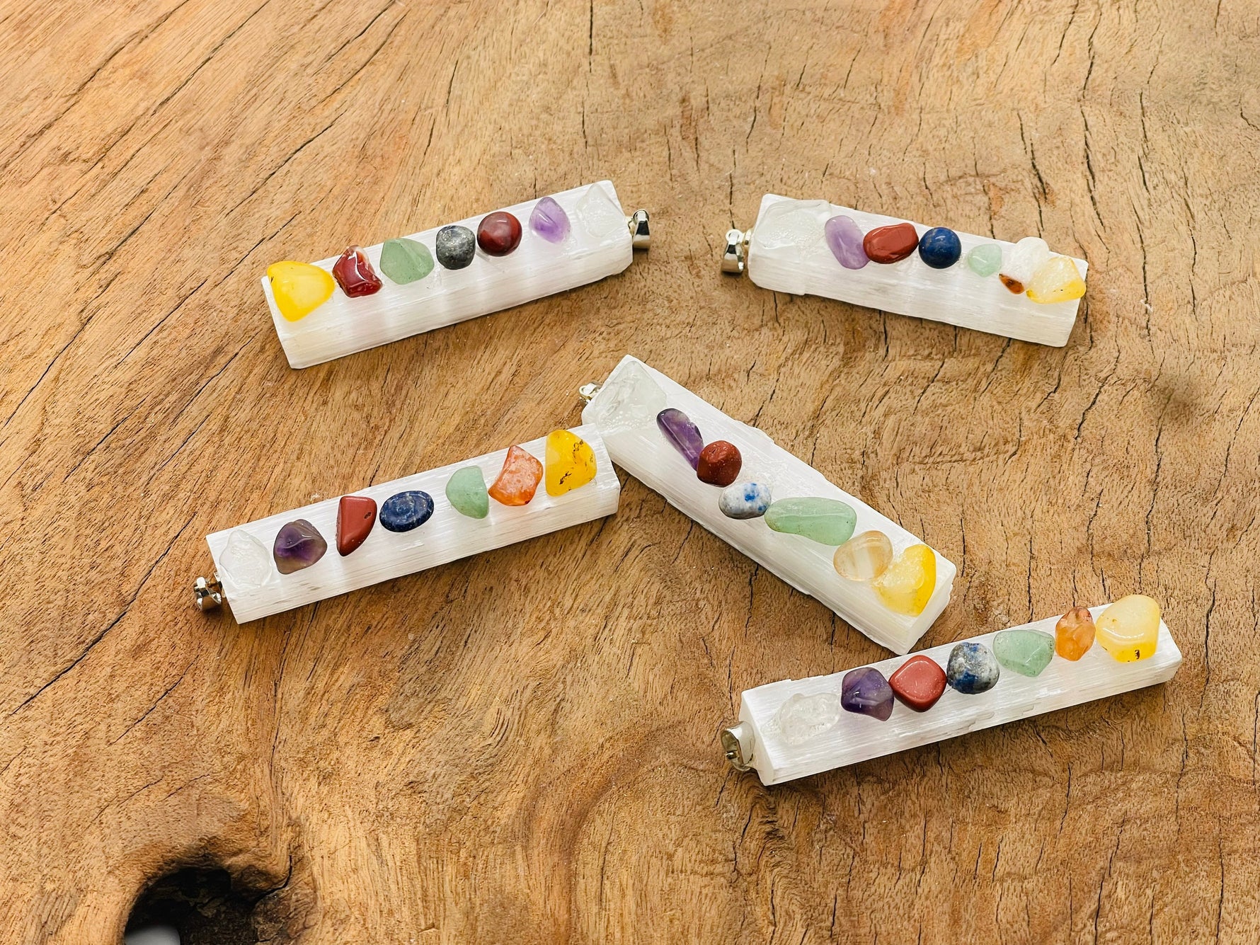 Chakra Selenite sticks pendant with a clear, natural crystal gemstone, designed for healing and spiritual energy.