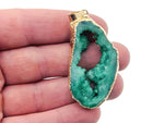 Green agate geode druzy slice pendant with natural crystalline interior, crafted by GemstoneGO.