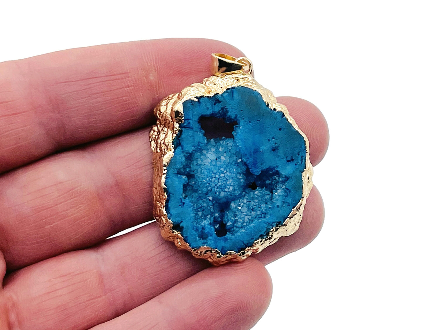 Blue agate geode druzy slice pendant with sparkling crystal interior, handcrafted gemstone jewelry from GemstoneGO.