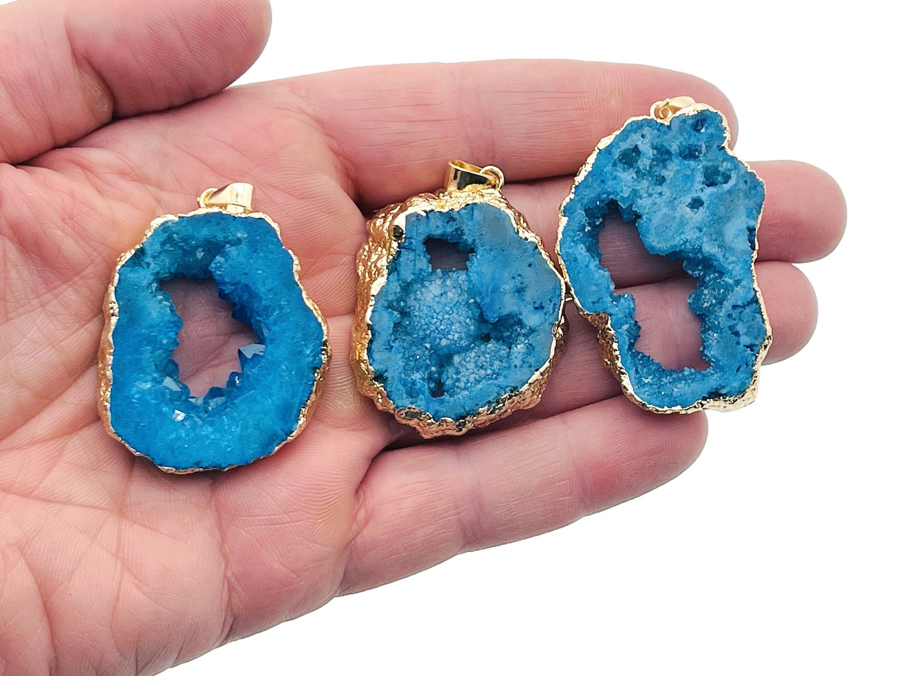 Blue agate geode druzy slice pendant with sparkling crystals, featuring a natural gemstone pendant by GemstoneGO.