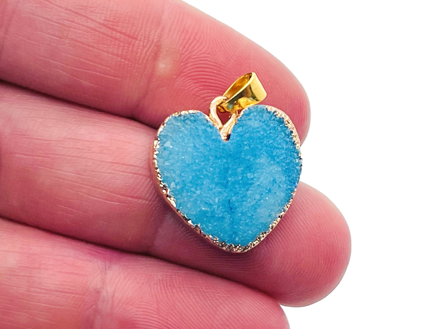 Blue agate heart geode druzy slice pendant featuring sparkling crystal details, handcrafted gemstone jewelry from GemstoneGO.